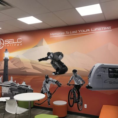 Wall graphics applied on the interior wall of the University by Superior Signs